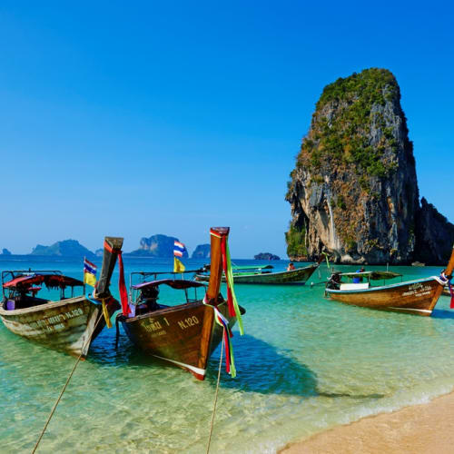 Sailing canoes camped at the shore of the Thailand sea